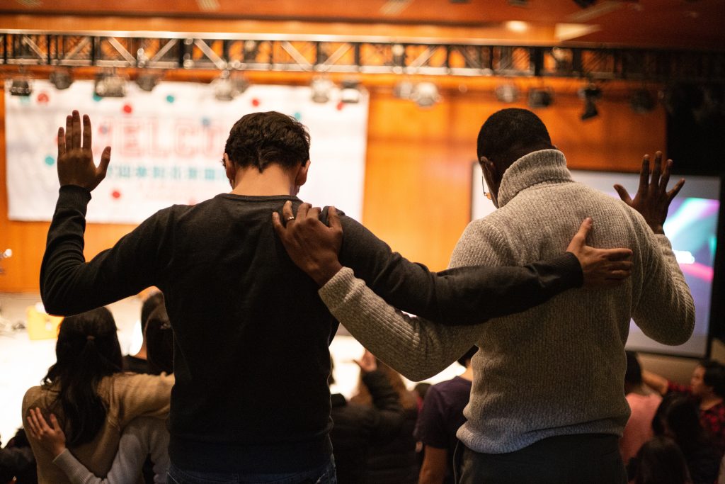 two people worshipping together in a healthy church culture